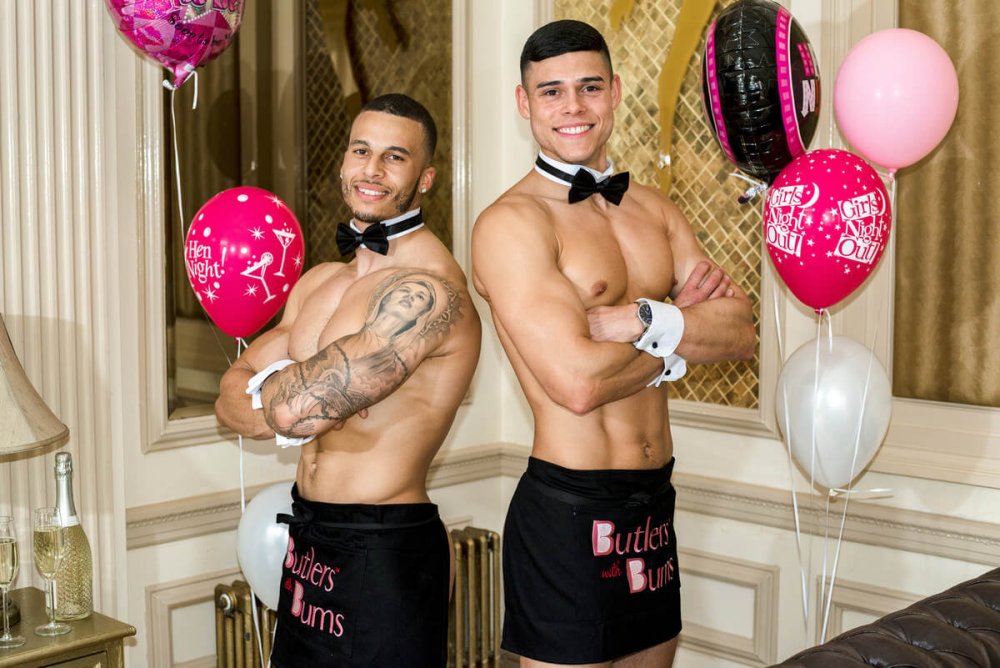 Two buff butlers in uniform