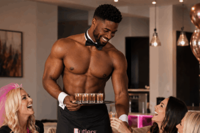 Butlers With Bums buff butler serving drinks at a hen party