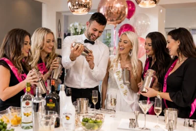 Butlers with Bums cocktail making class with the bride-to-be and friends during a fun hen party.