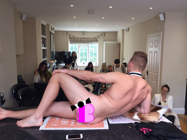 Women drawing a naked butler