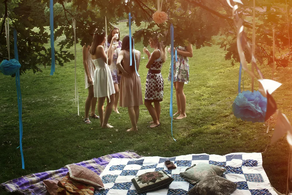 Girls on a summer hen party having a picnic