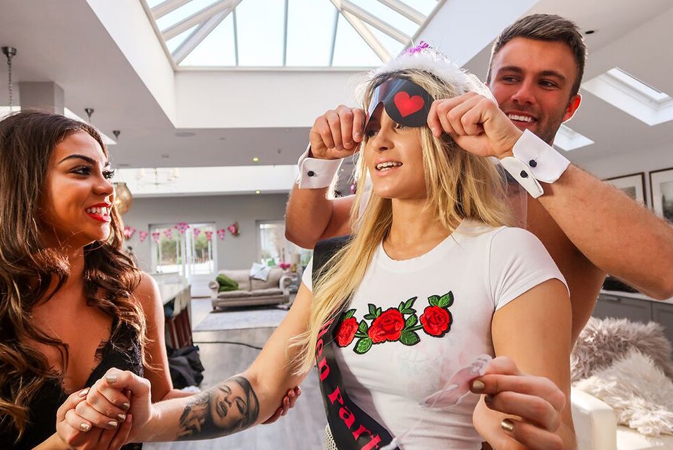 Hen party game of blindfolding bride